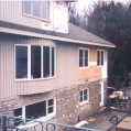 Installation of siding on back of home 